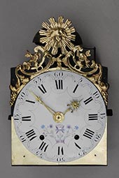 Comtoise-Uhr mit großer Sonnenspange und Adler-Symbol 