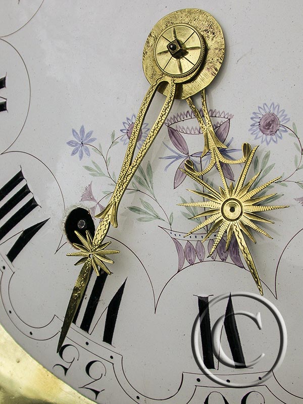 Comtoise-Uhr mit großer Sonnenspange und Adler-Symbol 
