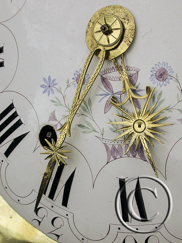 Comtoise-Uhr mit großer Sonnenspange und Adler-Symbol 